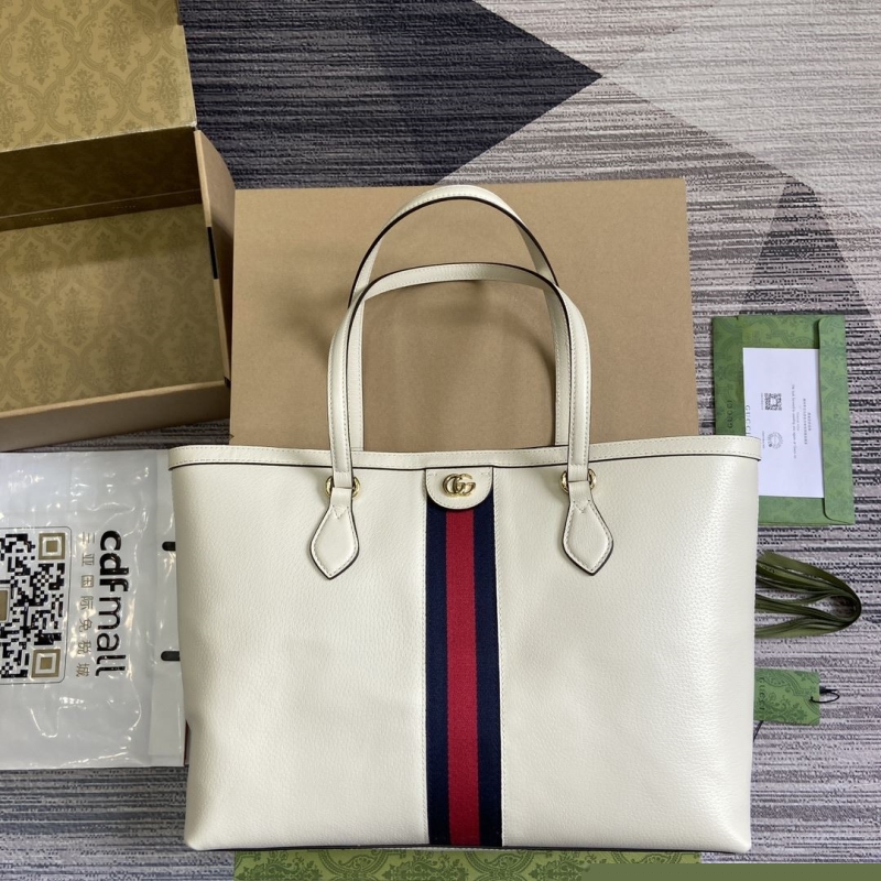G*u*i shopping bags